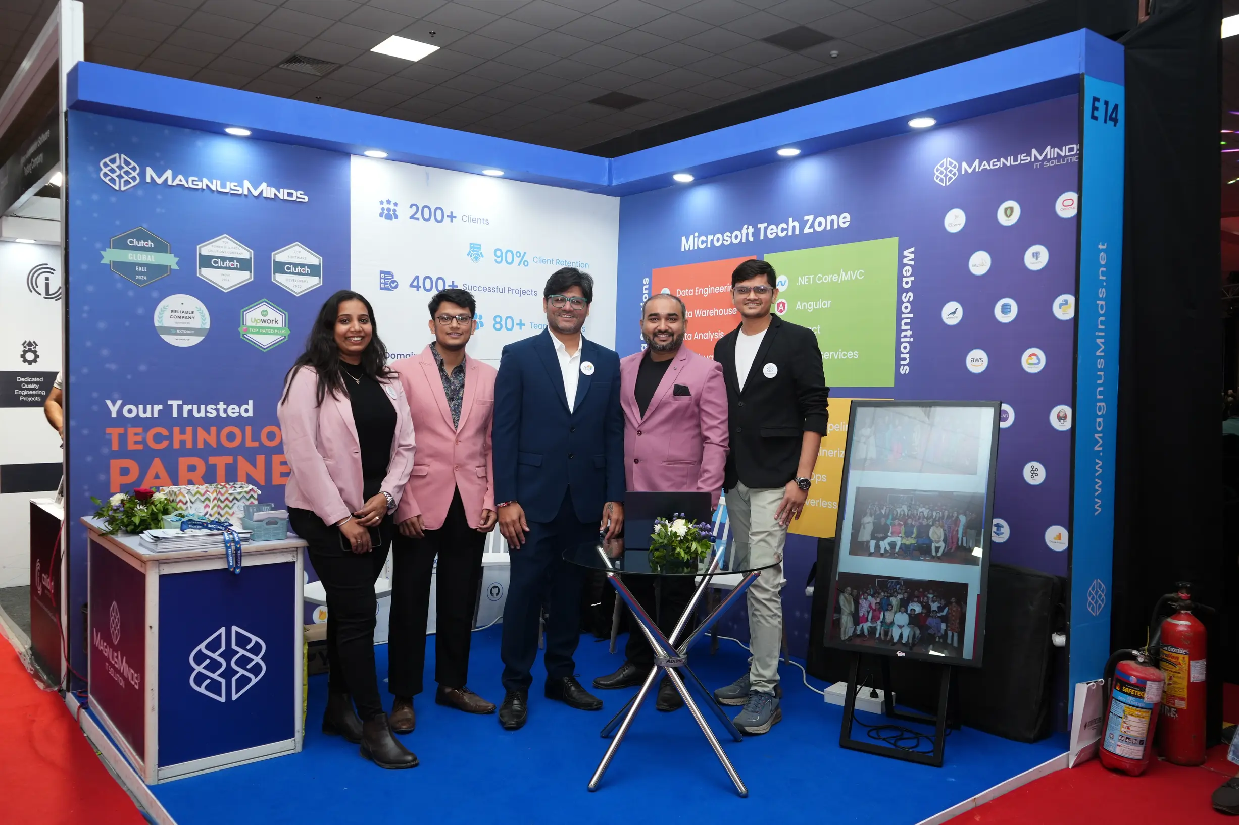 The MagnusMinds team at TechExpo Gujarat 2024, showcasing their expertise and engaging with visitors at the event