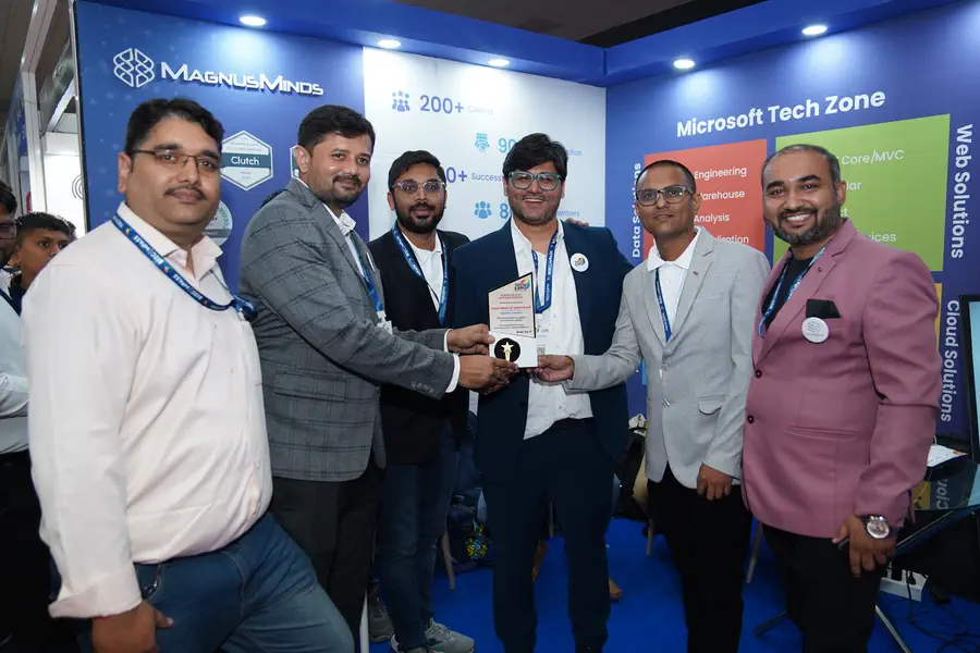 MagnusMinds founder and CEO Tejas Shah receiving the Honored to Exhibitors Award at TechExpo Gujarat 2024