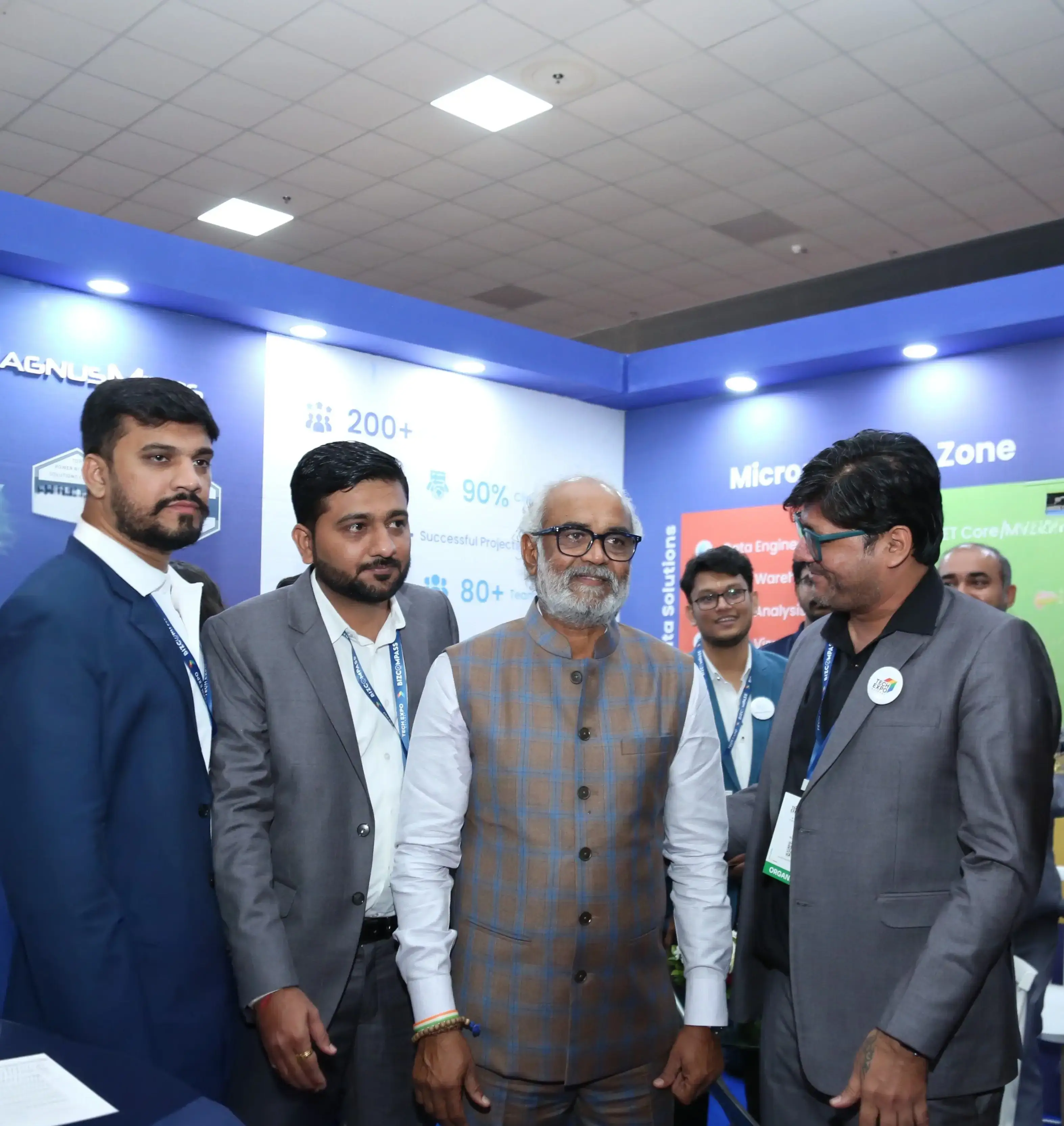 Tejas Shah, founder of MagnusMinds IT Solutions, meeting with savji dholakia at TechExpo Gujarat 2024 as an organizer