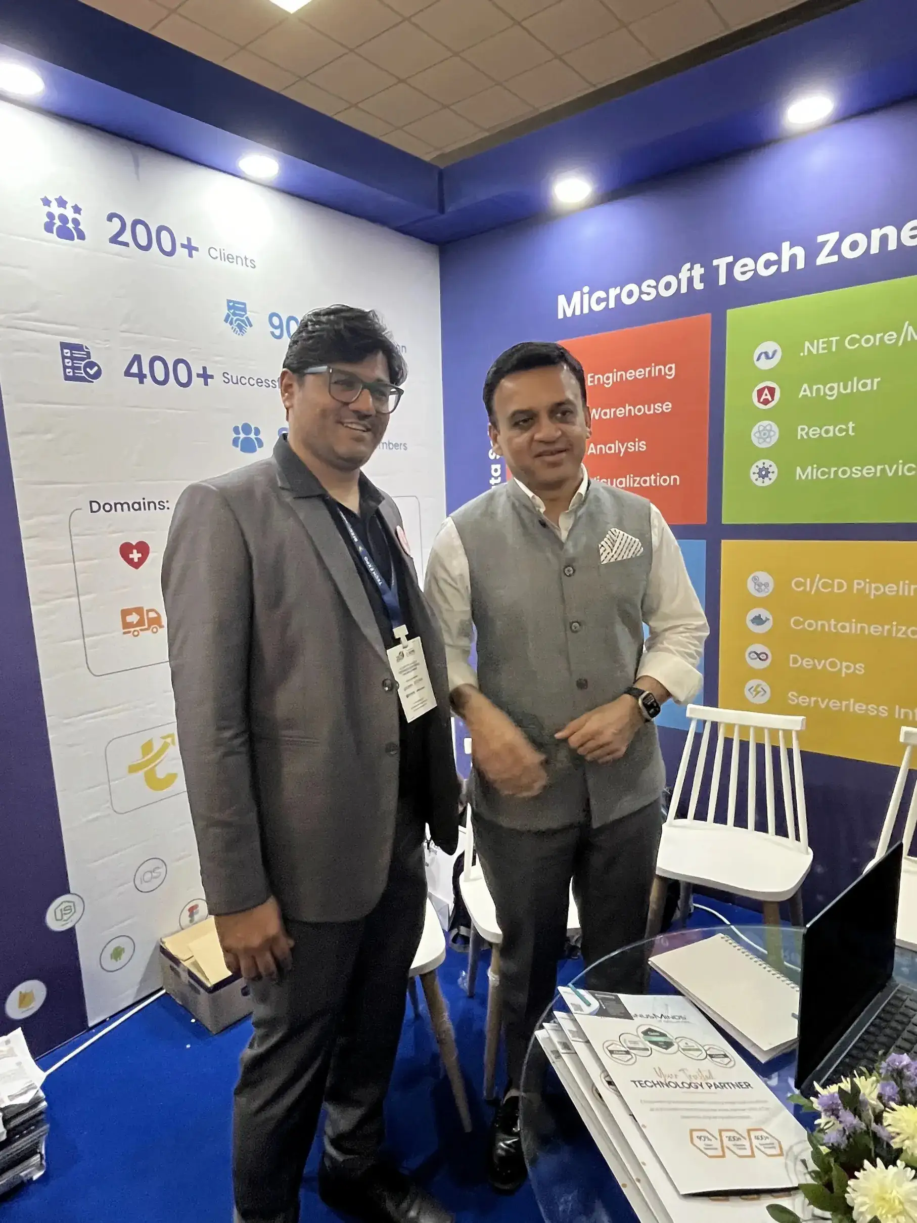 Tejas Shah, founder of MagnusMinds IT Solutions, meeting with chitrak shah shivalik at TechExpo Gujarat 2024 as an organizer