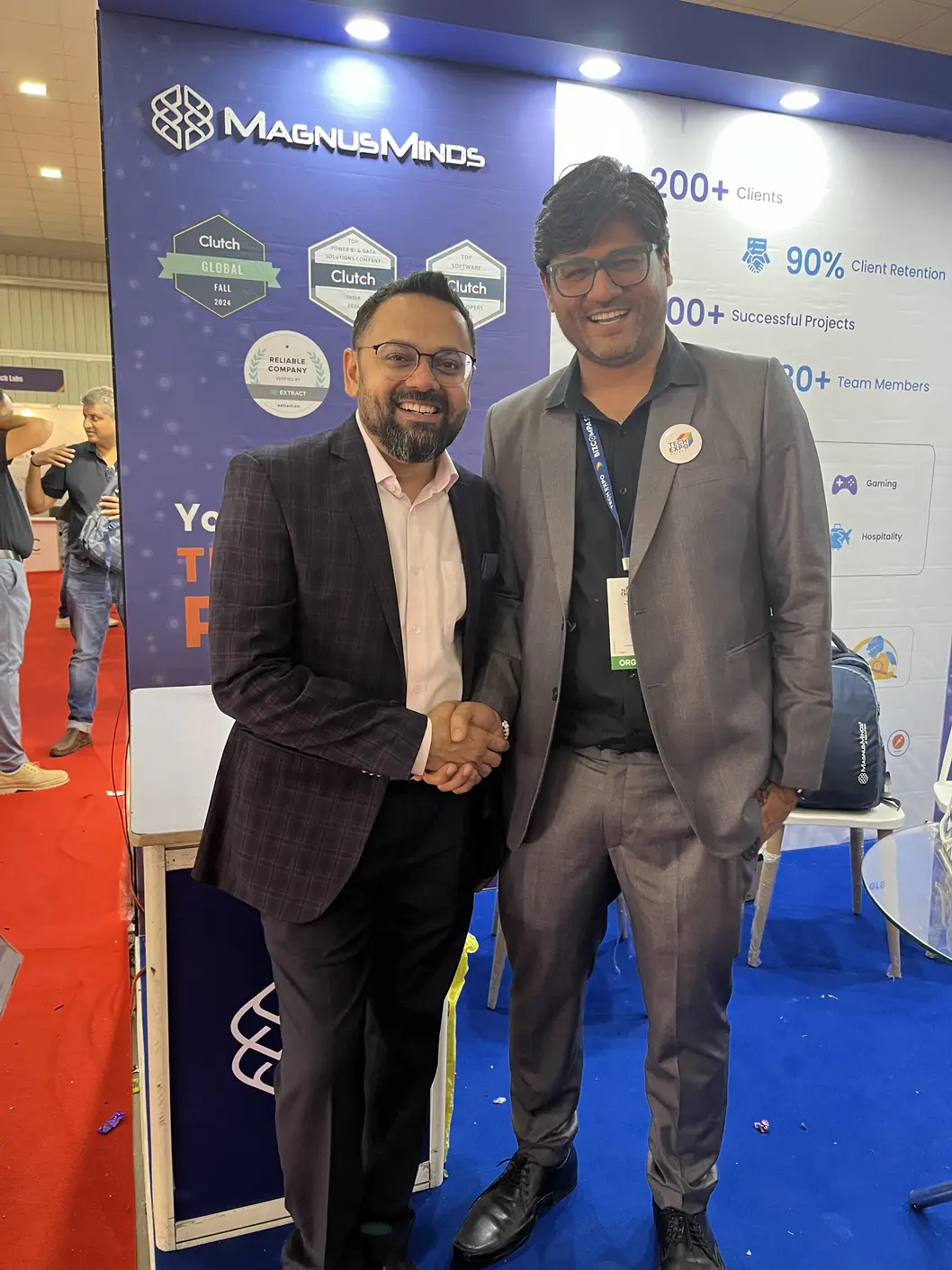 Tejas Shah, founder of MagnusMinds IT Solutions, meeting with vatsal shah at TechExpo Gujarat 2024 as an organizer